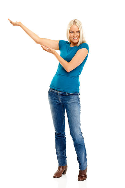 istock Attractive woman showing space for your advertisment 471867157