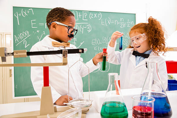educación y ciencia: retro niños jugando en los científicos. - child back to school mustache african ethnicity fotografías e imágenes de stock