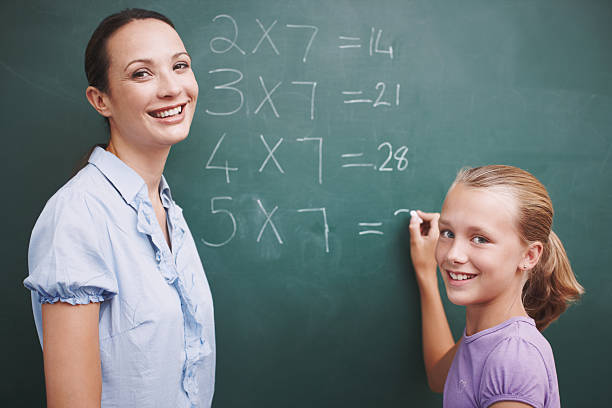 istock She's getting so good at her sums! 471871091