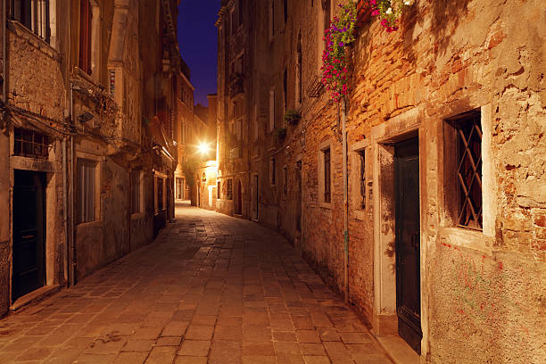 istock street in Venice at night 471871219
