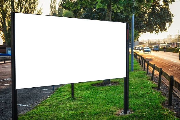 istock billboard sign at roadside early in the morning 471871447