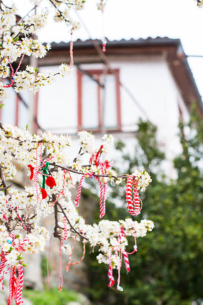 istock Different Bulgarian Martenitsa signs on the blossoming tree 471872368