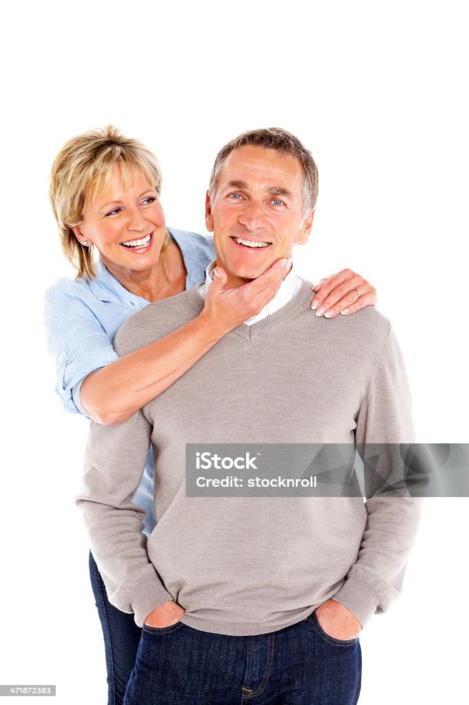 Счастливый Пожилая пара стоя вместе на белый - Стоковые фото 55-59 лет роялти-фри