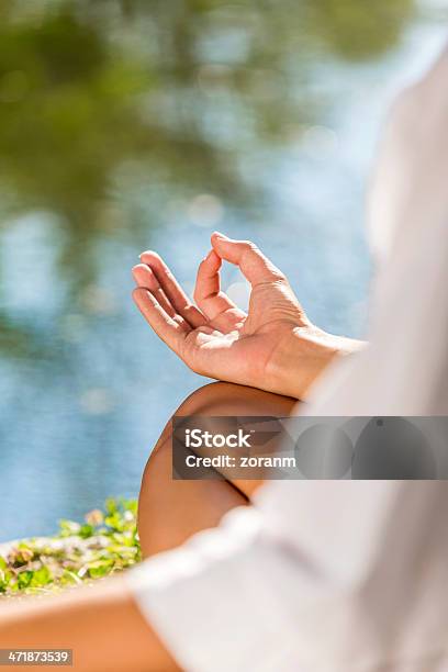 Meditating Stock Photo - Download Image Now - Adult, Adults Only, Alternative Lifestyle