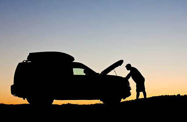 istock Man Having Car Trouble and Needing Roadside Assistance 471873699