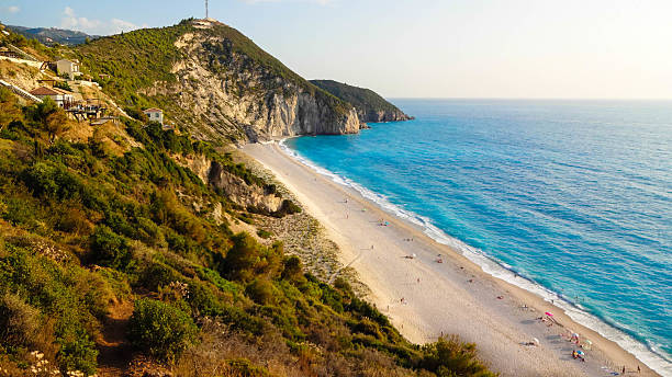 istock White beach with turquoise sea 471874897