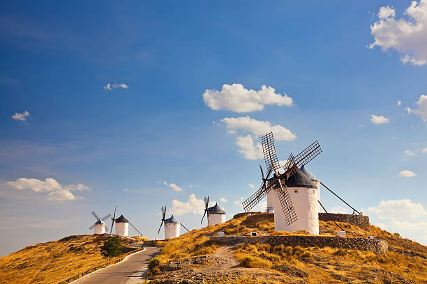 typical windmills of Region of Castilla la Mancha Group of windmills in Campo de Criptana. La Mancha, Spain campo de criptana stock pictures, royalty-free photos & images