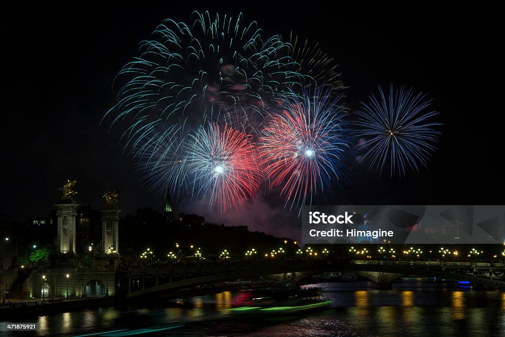 Bastilleday in Paris (France) Fireworks in Paris on July 14th, 2013. Bastille day Firework - Explosive Material Stock Photo