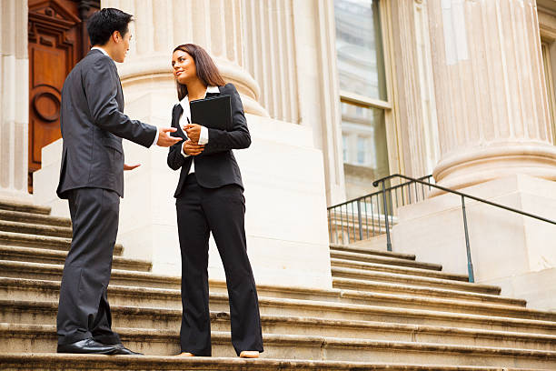istock Professionals in Discussion Outdoors 471876815
