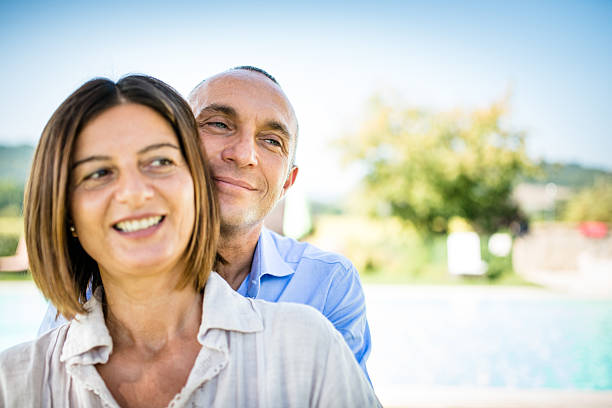 istock mature caucasian couple embracing 471877275