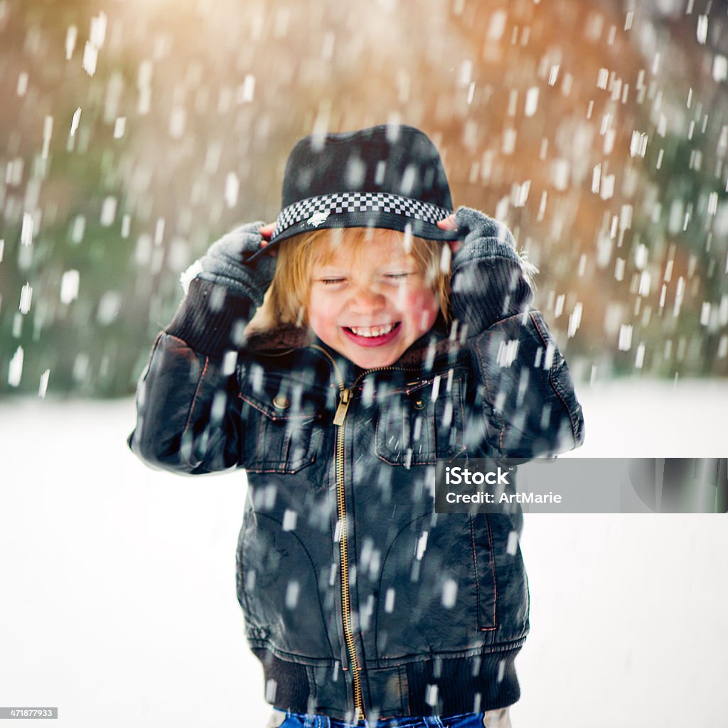 Let it snow Little boy outdoors in winter park 2-3 Years Stock Photo