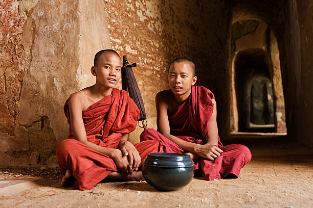  Pindaya, Myanmar - March 20,2011:Burmese nuns celebrate Pindaya Caves Festival, Pindaya, Shan State in Myanmar.Pindaya, a three hour drive from Helo is a city located in the hills of the Shan State.