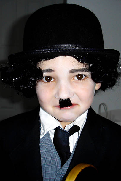 Little Chaplin Halloween Disfraz Foto de stock y más banco de imágenes de  Charlie Chaplin - Charlie Chaplin, Bigote, Niño - iStock