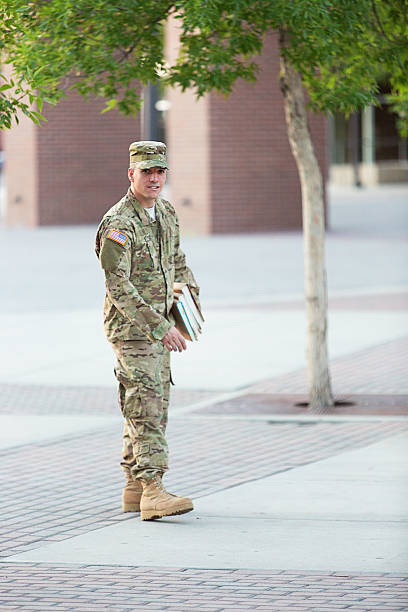 istock American Soldier with books 471878467
