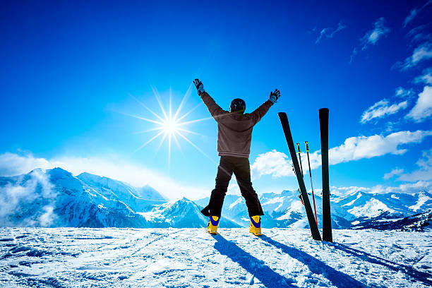 Skier on slope of ski resort