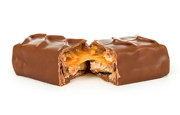 istock Chocolate covered bar of soft caramel 471879413