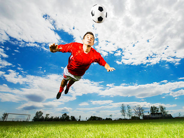istock Soccer player heading the ball. 471879803