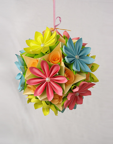 The Japanese kusudama is a paper ball made out of multiple identical origami shapes glued together. They were traditionally used as a ball for incense or potpourri but now we see them more for decoration or as a gift. Kusudama have medicinal properties, it can harmonize the energy in the room.