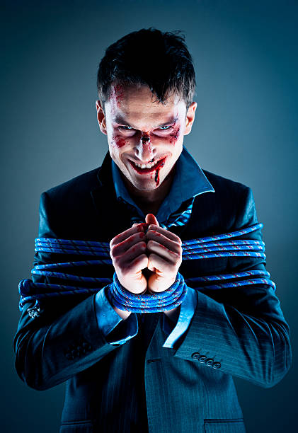istock Businessman tied up with rope 471879965