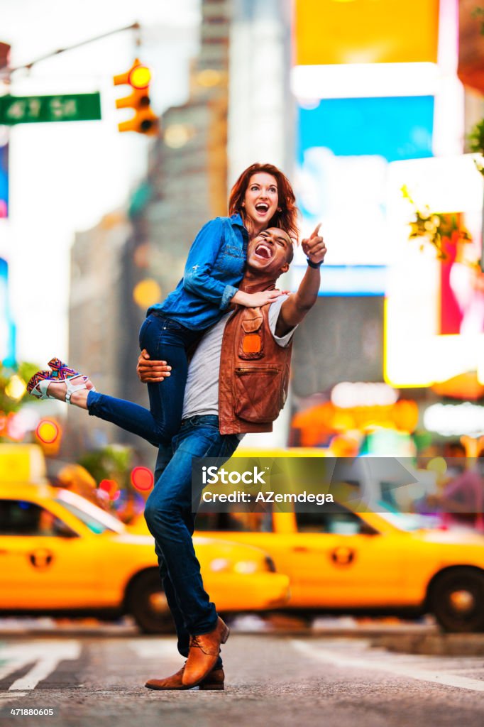 Couple in New York Couple in Times Square, New York, USA. New York City Stock Photo