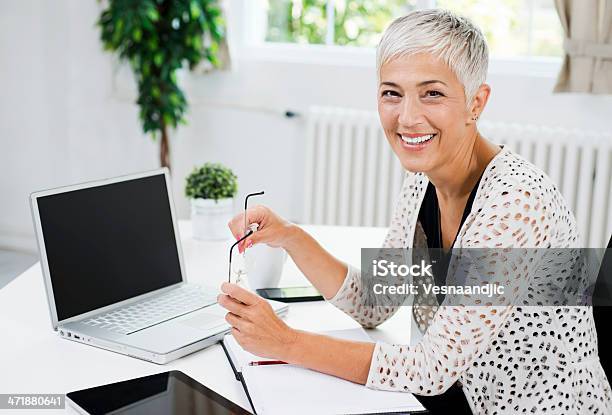 Mature Business Woman Stock Photo - Download Image Now - Senior Women, Sitting, Window