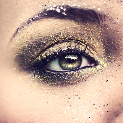 Beauty eye close up with glitter Short dof