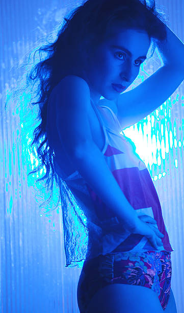 istock Sexy Woman In Blue Light 471882625