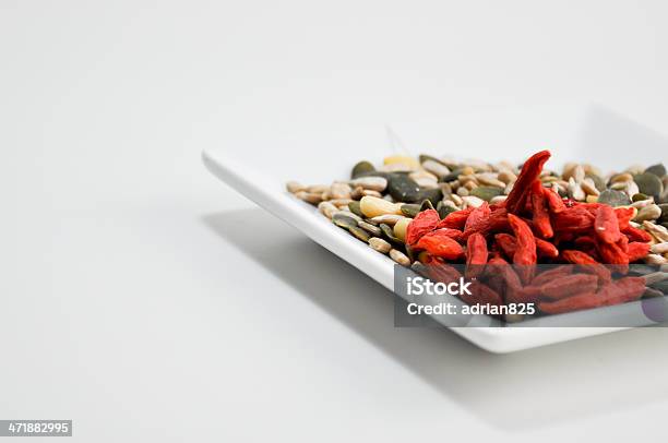 Foto de Comer Goji E Sementes De Abóbora e mais fotos de stock de Alimentação Saudável - Alimentação Saudável, Amontoamento, Antioxidante