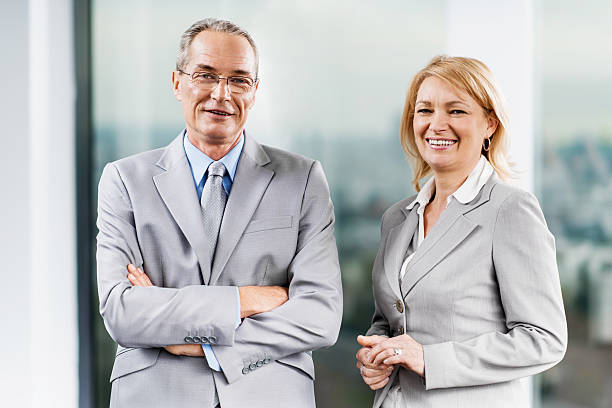 istock Two happy business colleagues. 471883037