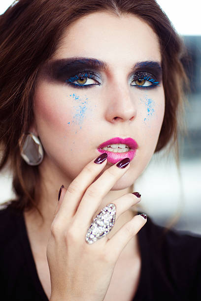 istock The woman with a creative smoky eyes make-up 471883930