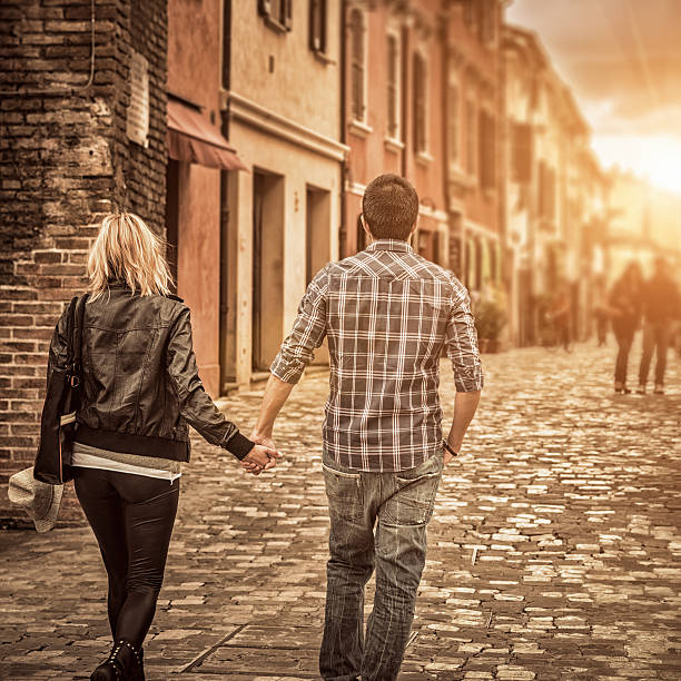 istock couple walking on the city 471884077