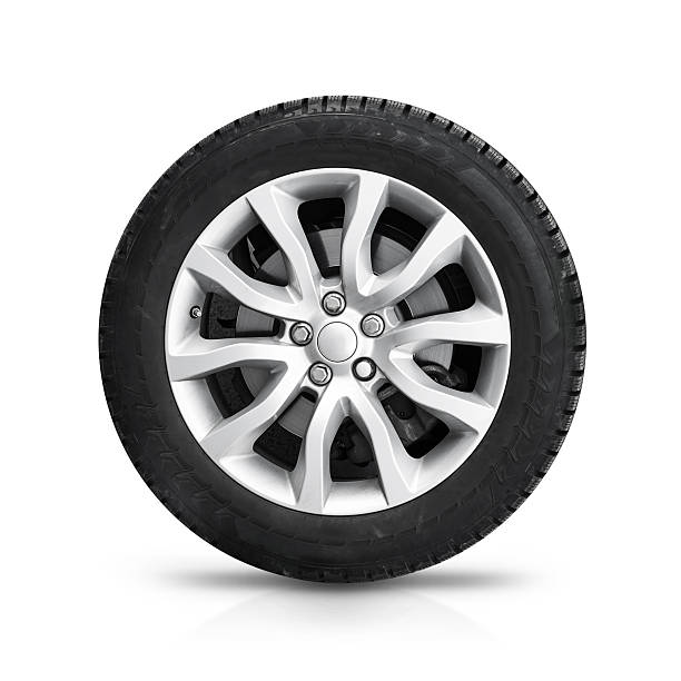 istock Automotive wheel on gray light alloy disc isolated 471884738