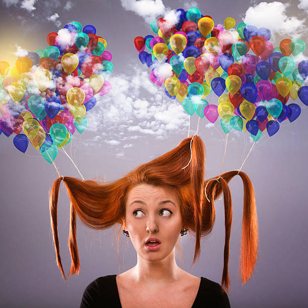 Girl With Balloons Stock Photo - Download Image Now - Picking Up, Adult,  Balloon - iStock