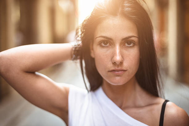 istock fashion model posing on the street 471885383