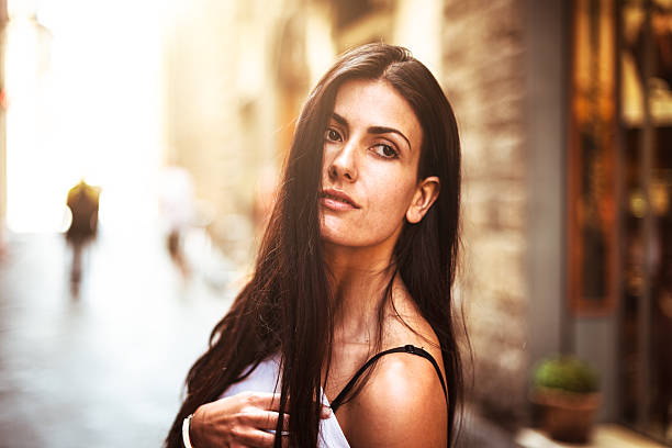 istock fashion model posing on the street 471885389