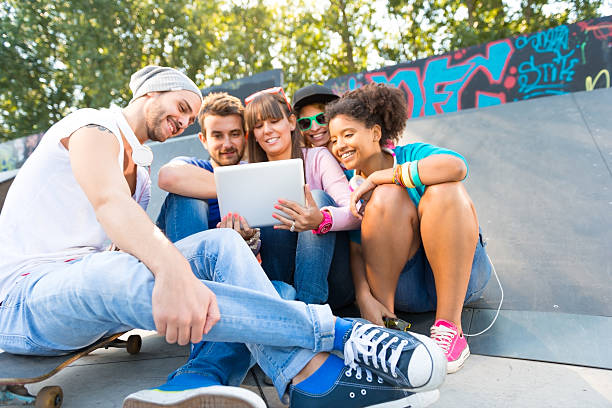 istock Young people having fun at the skatepark 471885533