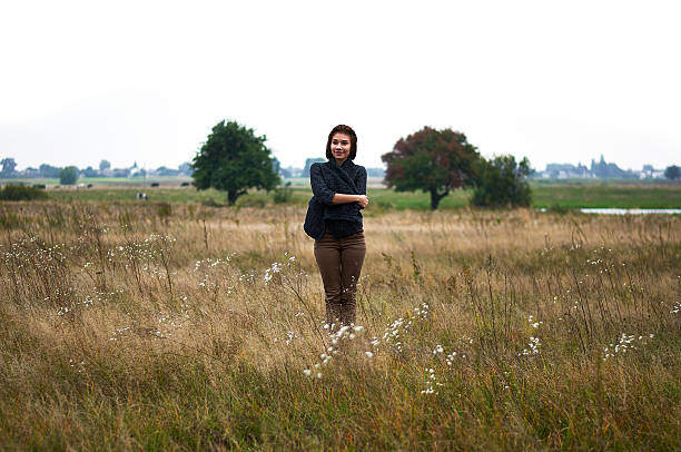 Free Stock Photo of Woman With Long Hair Standing in a Field | Download ...