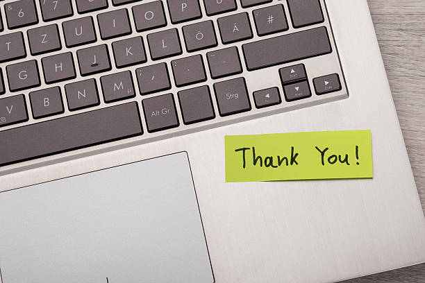 istock Thank You ! Sticky Note On Laptop 471886992