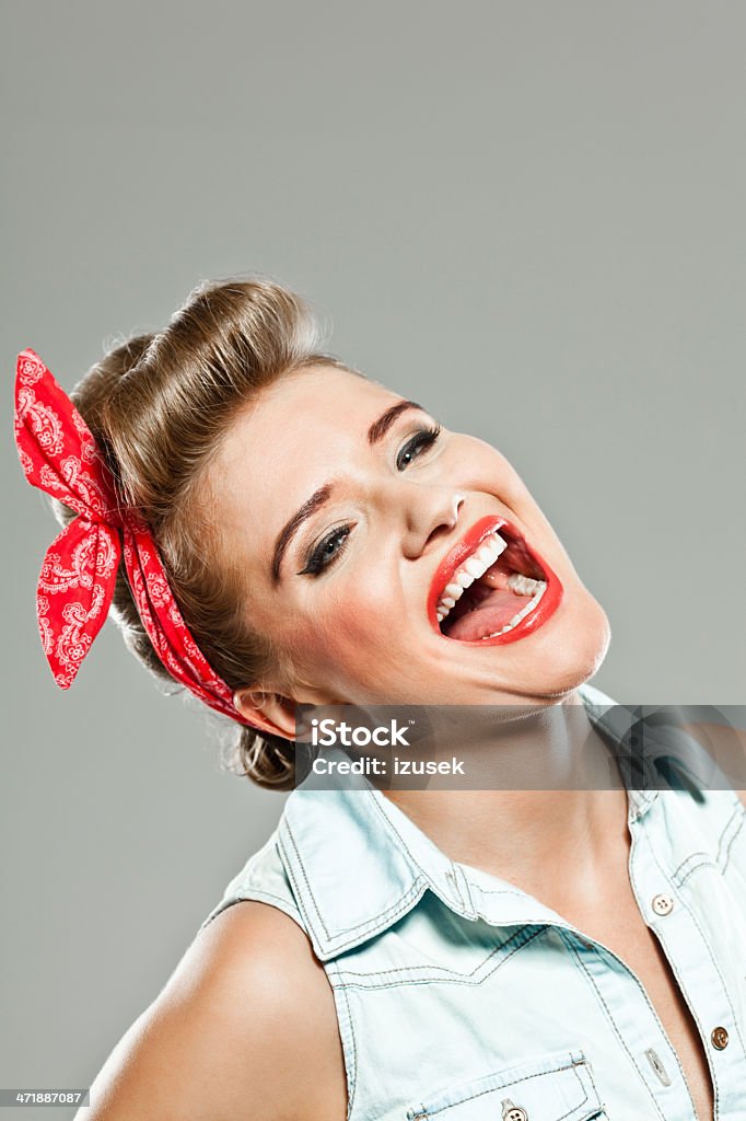 Happy pin-up style woman Portrait of excited pin-up style young woman. 20-24 Years Stock Photo