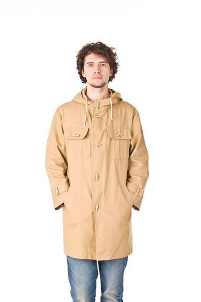 istock Handsome man in brown vintage raincoat. 471887178
