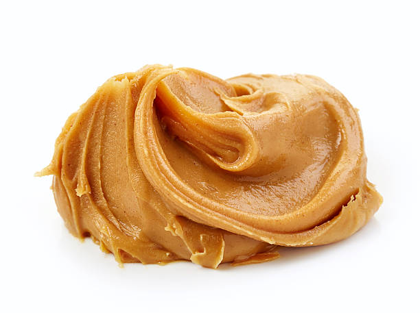 peanut butter peanut butter spread isolated on white background fat nutrient photos stock pictures, royalty-free photos & images