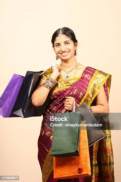 Young Indian Woman With Shopping Bags Stock Photo - Download Image Now - Adult, Adults Only, Asia