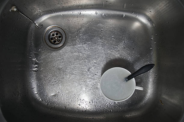 istock dirty metal kitchen sink 471889421