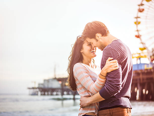 istock Happy couple on LA beach 471890089