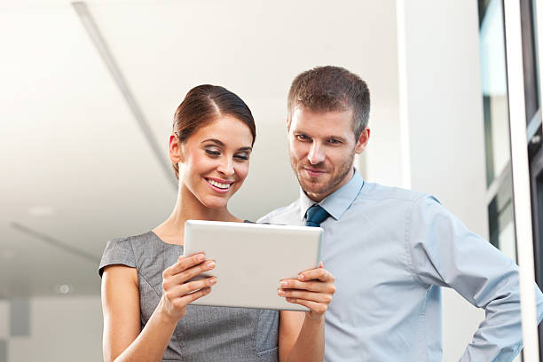 istock Business people with digital tablet 471890781
