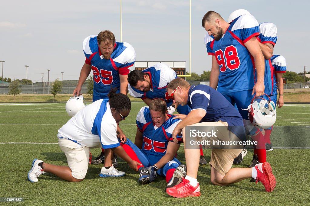 Lesioni Giocatore di Football americano - Foto stock royalty-free di Lesionato