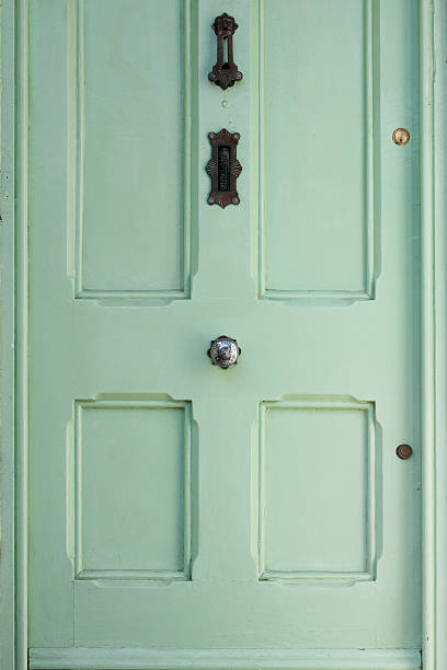 istock Light Green Door with iron black ornaments 471891934