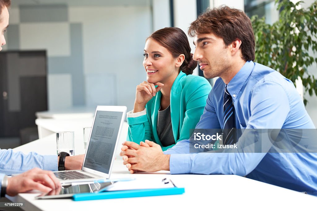 Business meeting Businesspeople discussing new strategy of their company. Adult Stock Photo