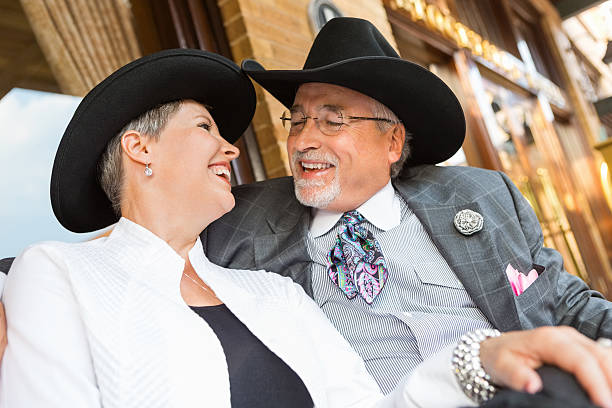 istock Senior western couple smiling together while on date 471893029