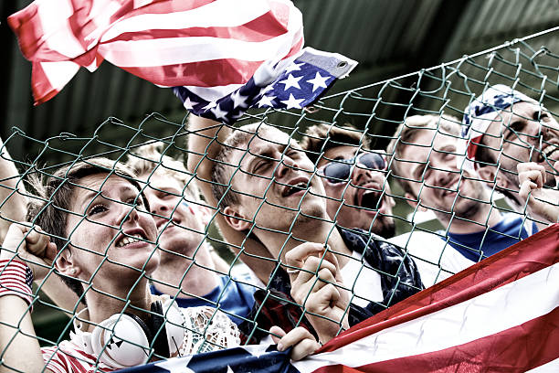 istock Sports fans cheering a game 471894411